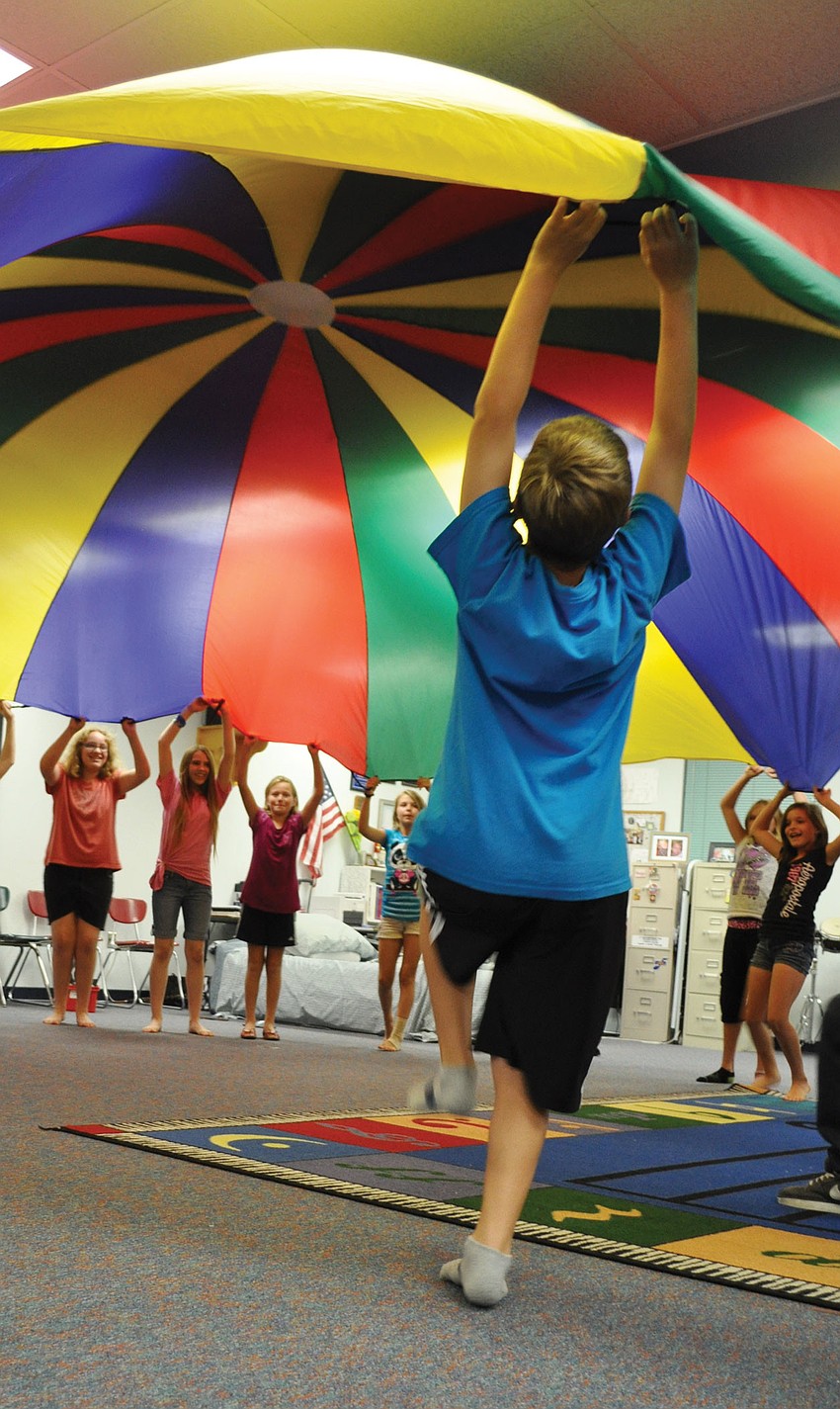 Students used a parachute during Gene Witt Elementary's Music All-Nighter June 1. Published June 14, 2012.