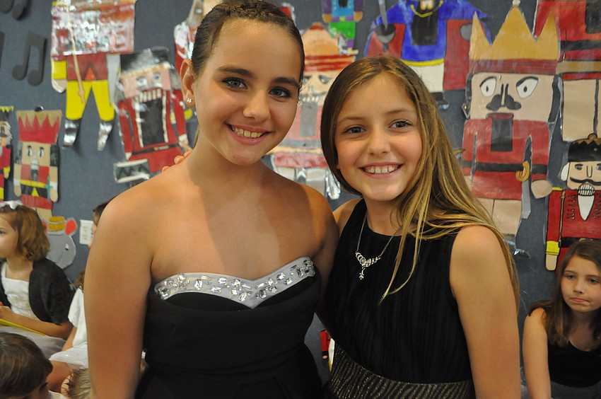 Fifth graders Chelsea Lea and Ella LaClair sang in the choir.