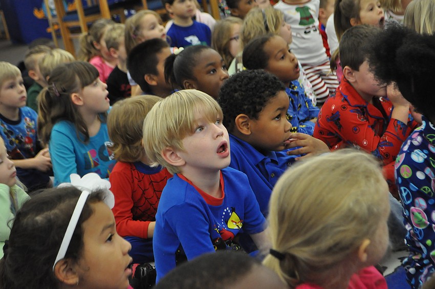 Kids gasp as they hear about the Polar Express.