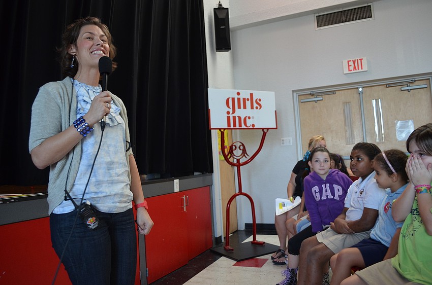 Program Director Marisa Monroe gives out monthly awards and announces Girl of the Year.