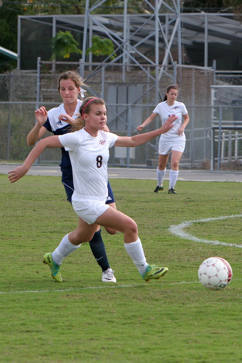 North Portâ€™s Hunter Carrell, No. 10, chases after Riverviewâ€™s Ansley Saba, No. 8, Saturday, Jan. 12, at Riverview High School.