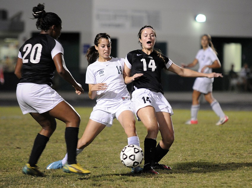 Lakewood Ranch midfielder Juliana Guida battles Braden River forward Carly Provan for possession in the Class 4A-District 11 semifinals Jan. 16.