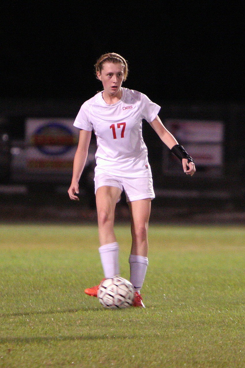 Cardinal Mooneyâ€™s Emily Brown, No. 17, looks to pass the ball.