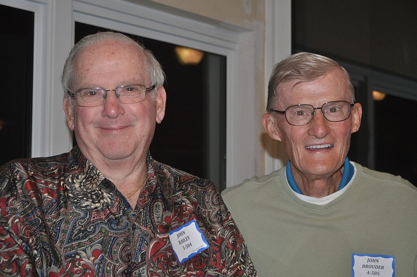 John Bailey and John Brouder tend bar.