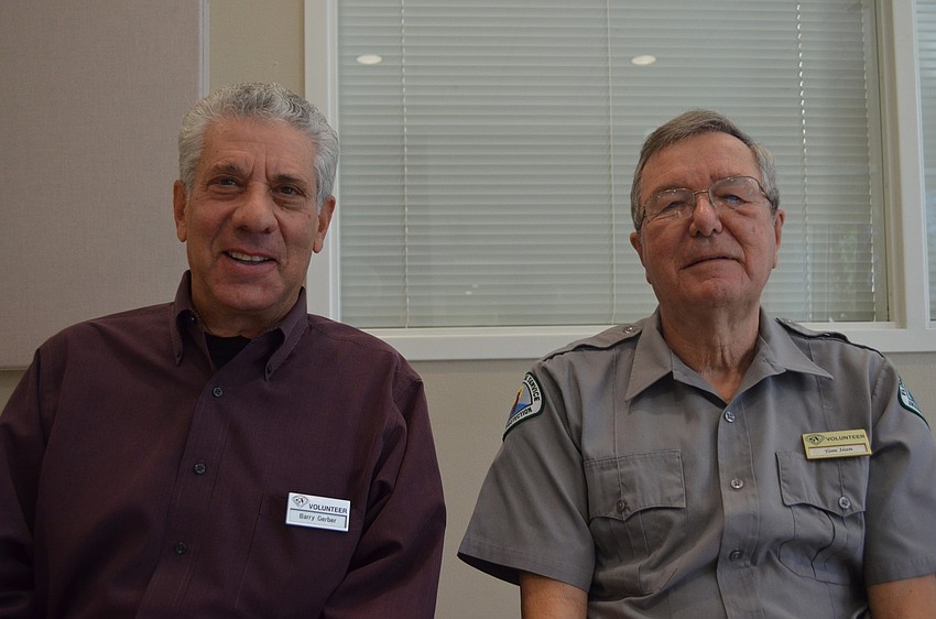 Volunteers Berry Gerber and Tom Jean informed people about Oscar Sherer State Park.