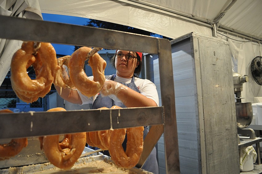 Callie Parsons prepares Amish doughnuts.