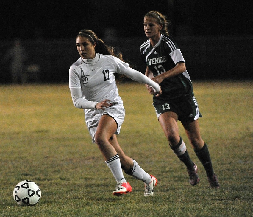 Lakewood Ranch freshman Hannah Miller pushes the ball up field.