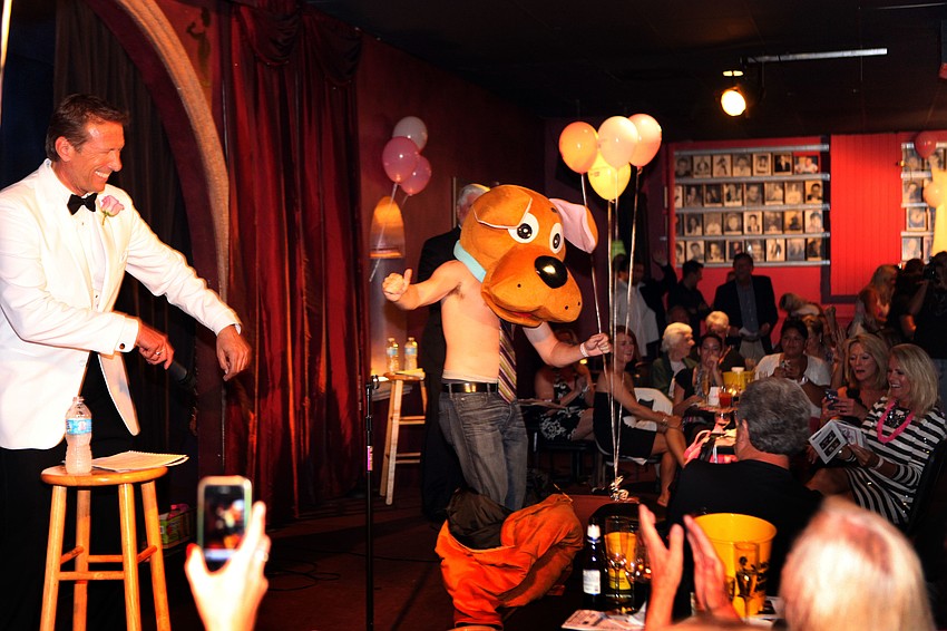 Blair Watkins came out in a dog costume and the song â€œWho Let The Dogs Outâ€.