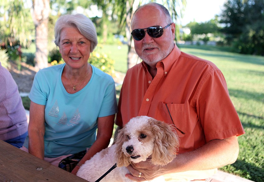 Norma and Sam Morrman with their friendâ€™s dog, Taffy, 1.