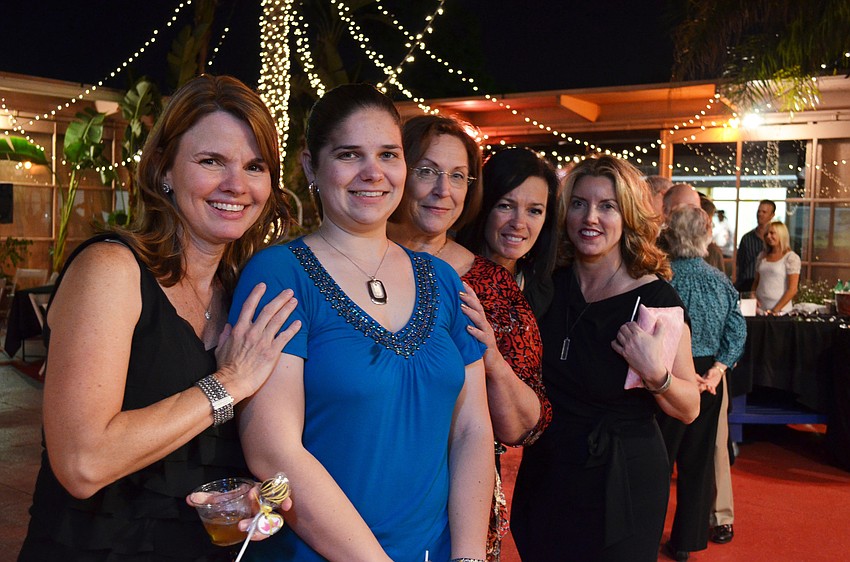Kelly Saba, cancer survivor Ana Murphy next to her mom, Valerie Murphy, and Jennifer Peters and Kathy O'Connor