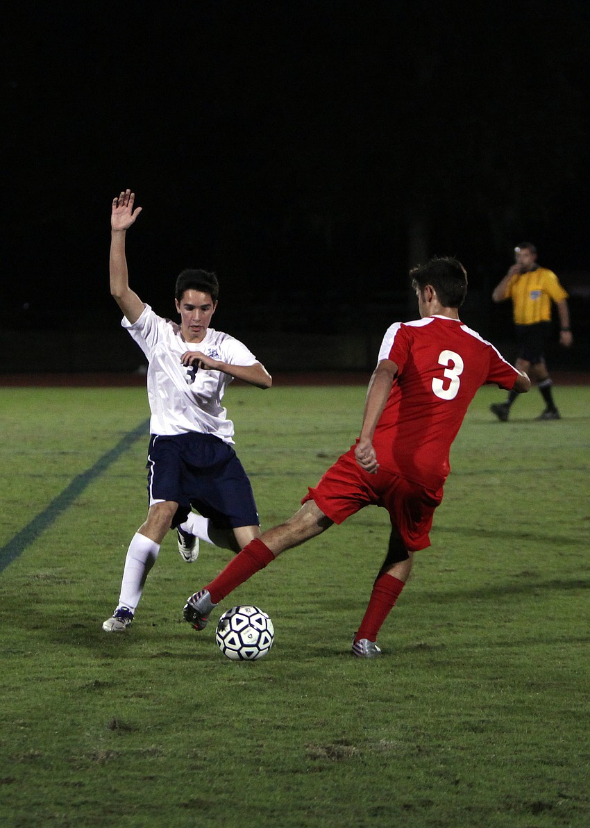ODAâ€™s Alvaro Gonzales, No. 3, and Cardinal Mooneyâ€™s John Rodman. No. 3, fight for the ball.