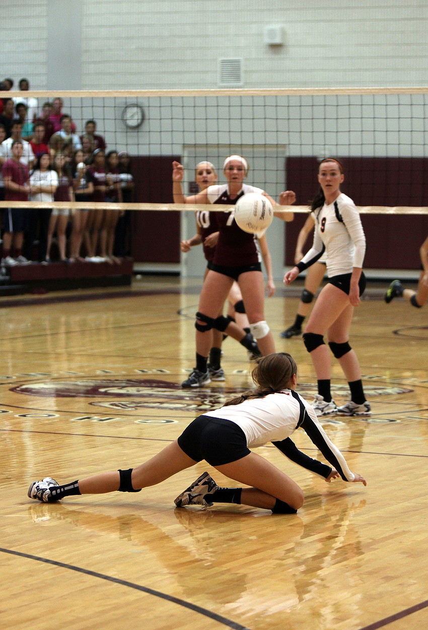 Lauren Hochstetler, No. 1, dives for the ball.