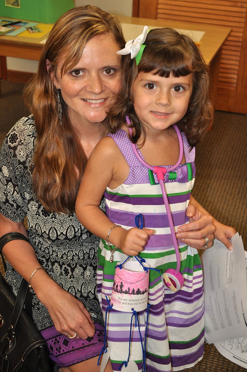 Carrie De Wolf with her daughter, Amaiya, 4.