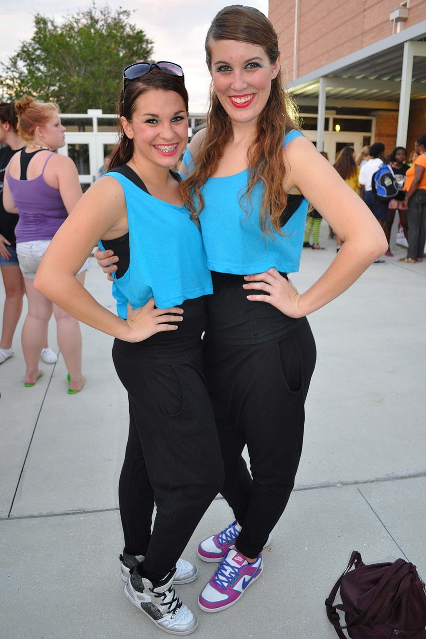 Emily Harris and Victoria Denison and the rest of the varsity dance team dressed up for '80s day Sept. 27.
