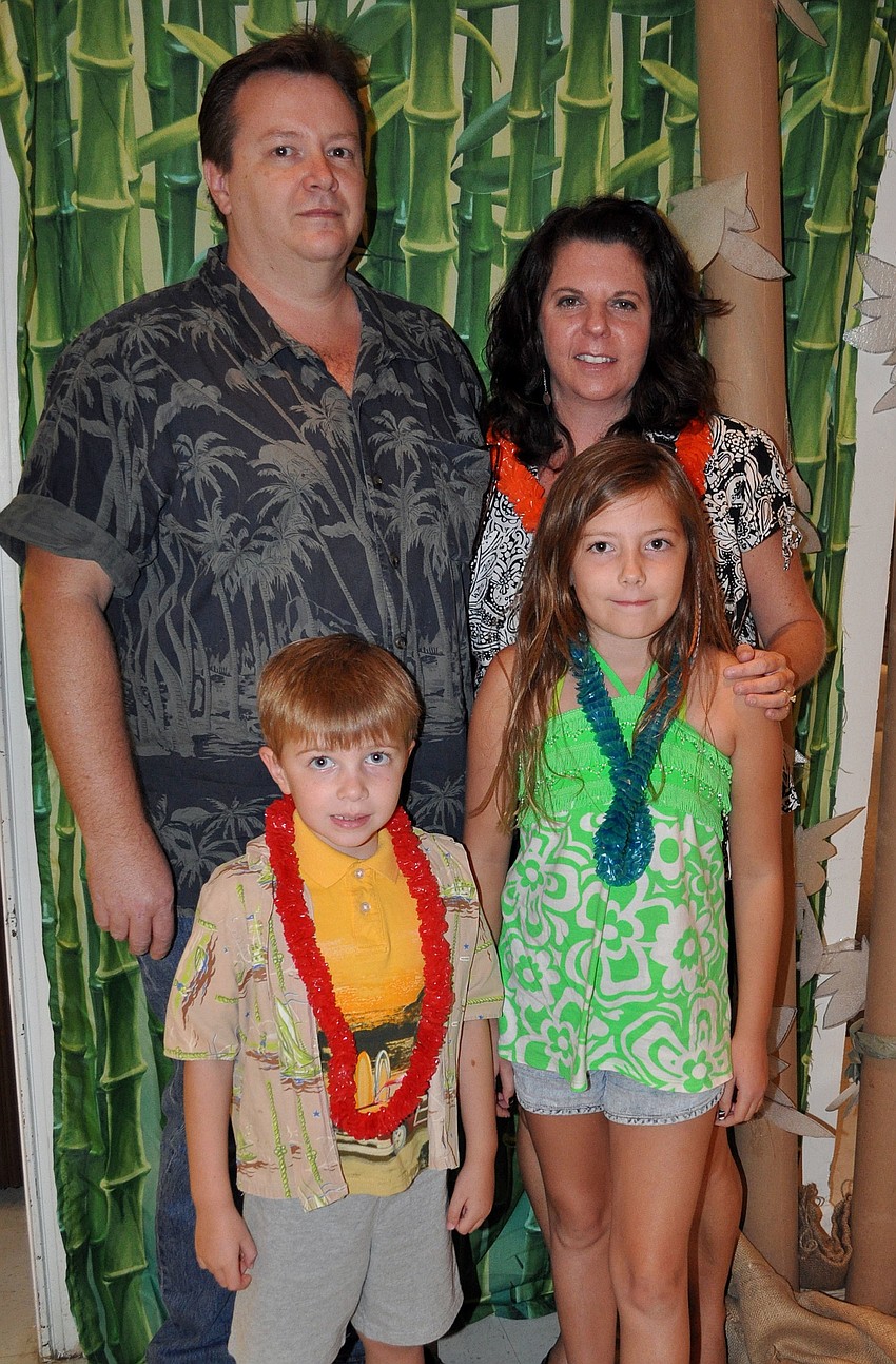 Chris and Darlene Urban with their children Jake, 5, and Riley, 10