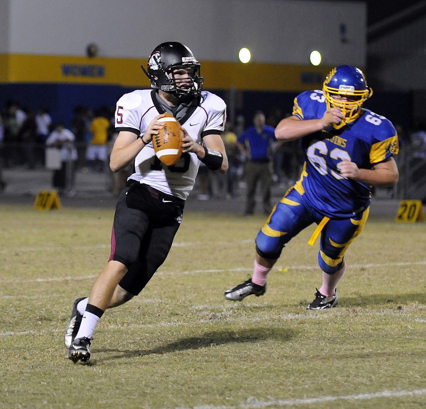Braden River quarterback Dusty Peebles searches for an open receiver during the Pirates final drive of the game.