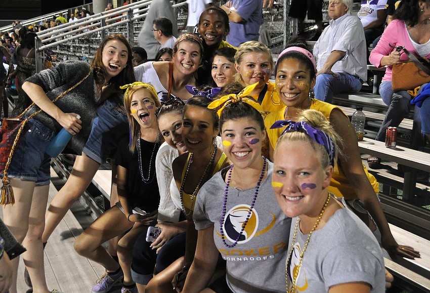 Fans cheer on Booker from the stands
