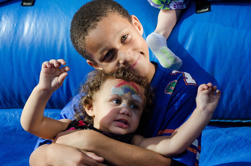 Lila Shelby and her brother Anthony Quandt-Judd played in the bouncy house at J.D. Hamel Park.