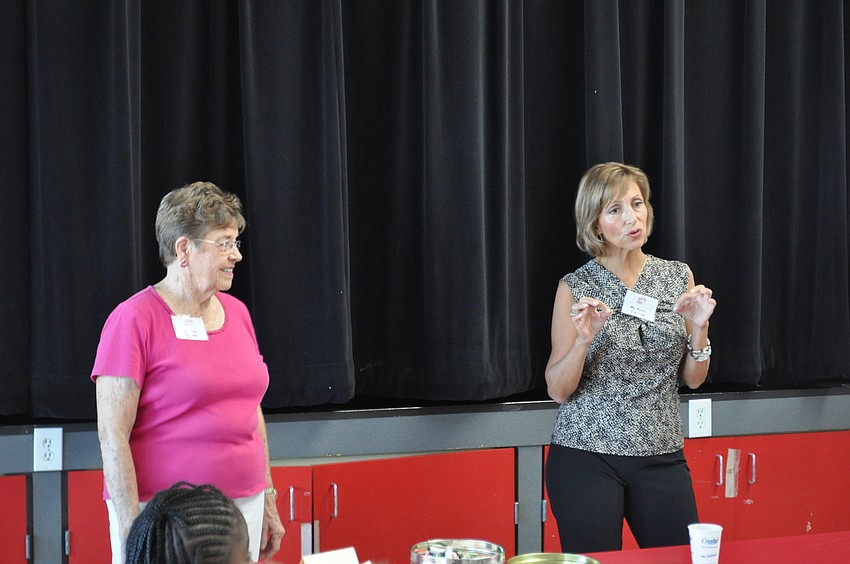 Jean Henry and Pavitra Ciavardone speak to the students.