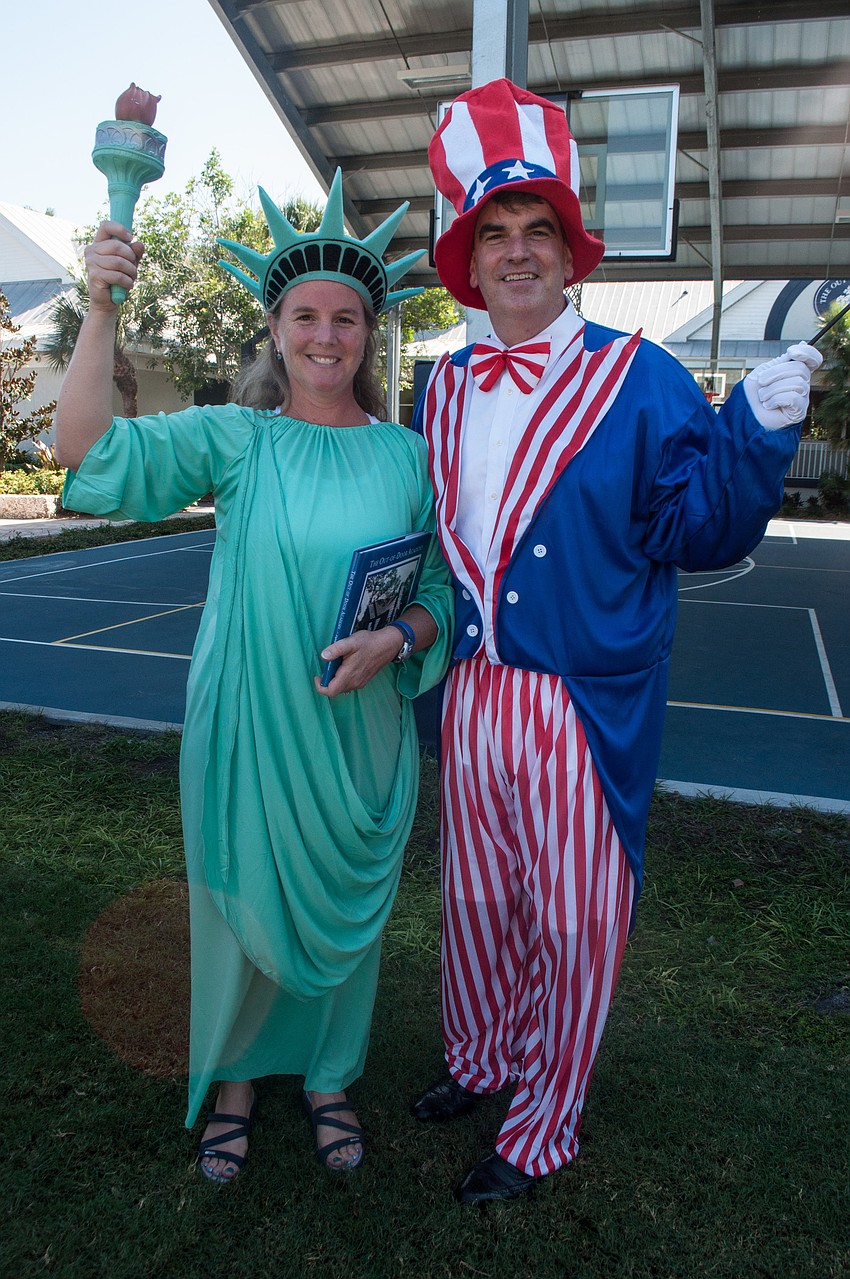 Head of School David Mahler lead the Halloween costume parade with his wife Elizabeth.