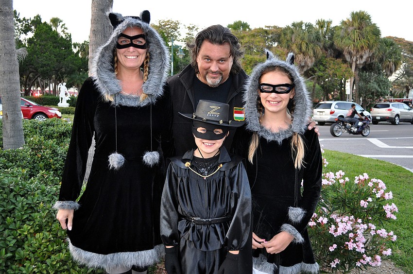 Erika, Stephen, Bence, 7, and Csenge, 10, Csicsek