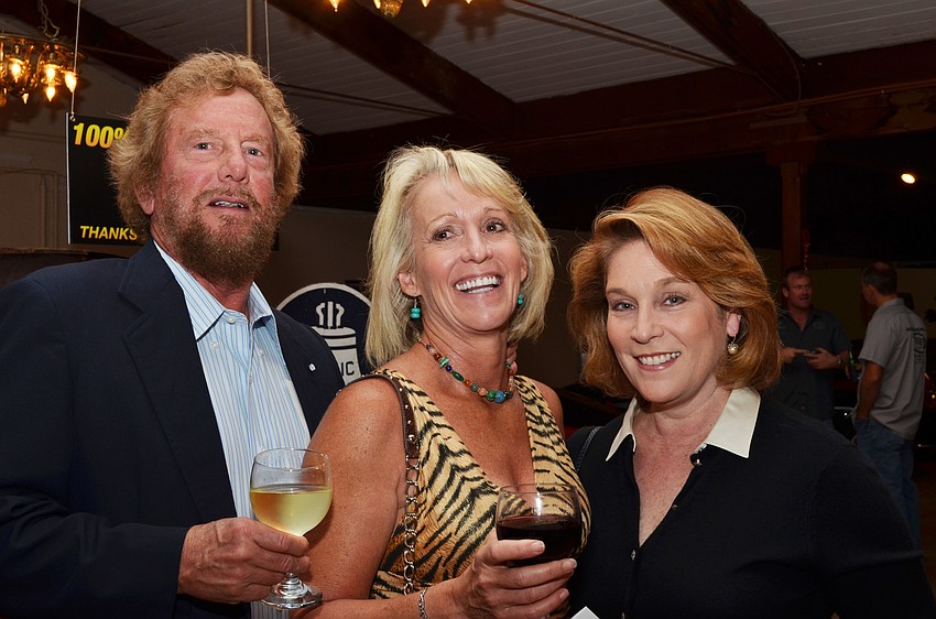 Dr. Nick and Kim Griffin, with Lisa Saba