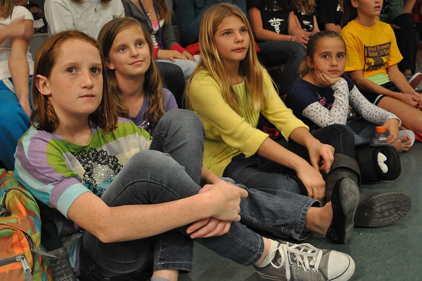Anita Thornton, left, watched fellow students perform.