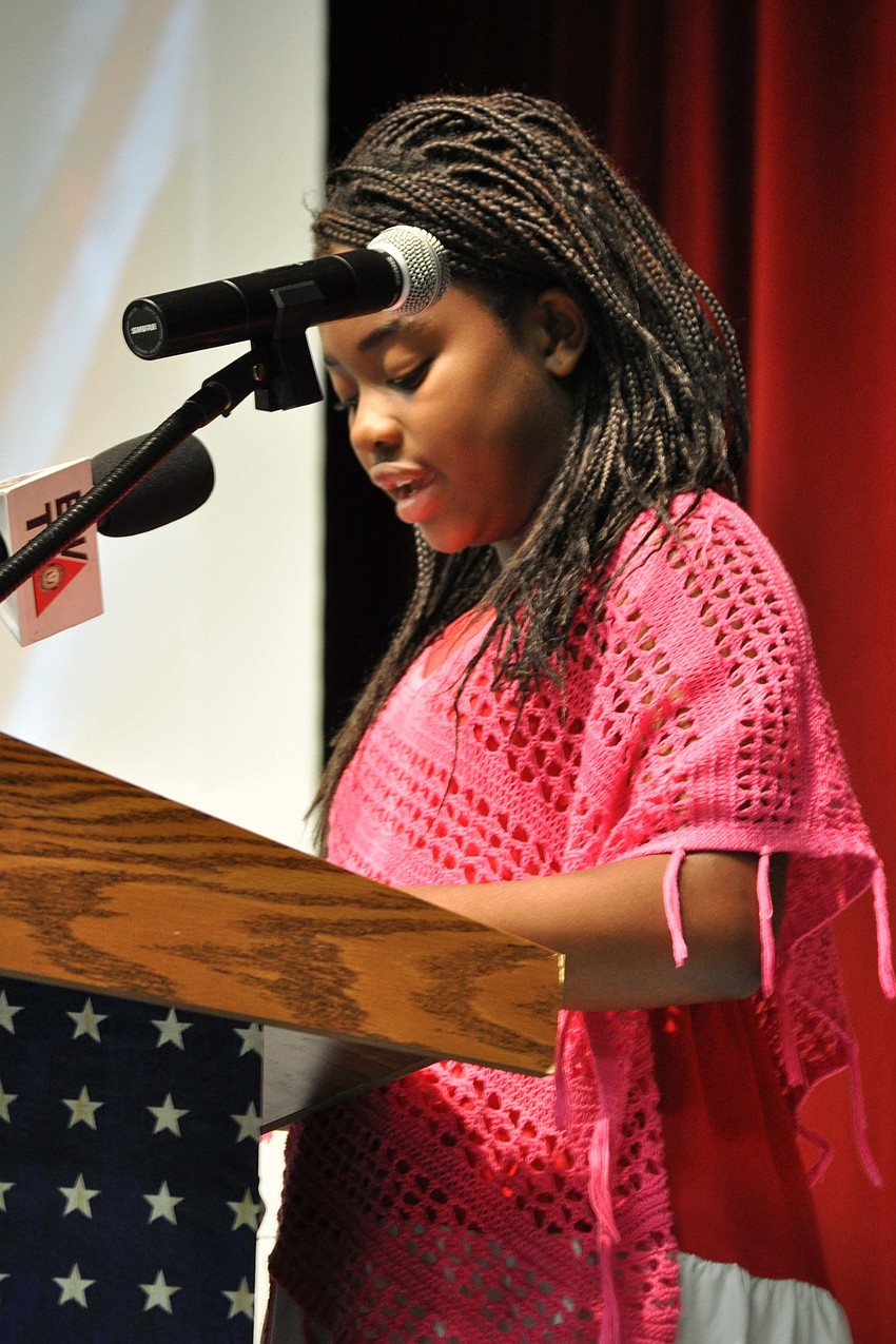 Aba Sankah, 10, was one of three student speakers at Freedom Elementary's ceremony.