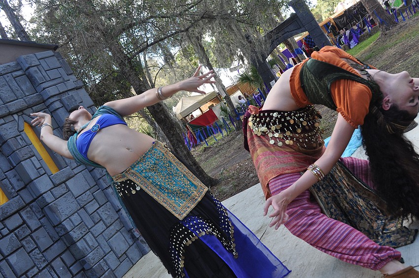 Jessica and Angela Hicks perform belly dancing.