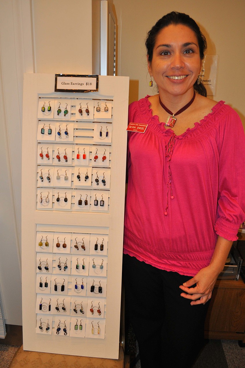 Silvia Engel makes fused-glass earrings.