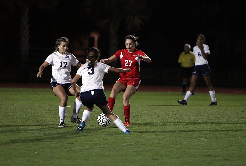 Cardinal Mooneyâ€™s Sarah Quick, No. 27, tries to get the ball past ODAâ€™s Summer Dunn, No. 17, and Elena Ciaccio, No. 3.