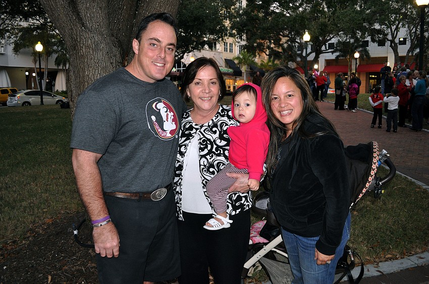 Scott Henderson, Sonja Newton with her granddaughter, Milani Henderson, 18 mos., and Carly Henderson.