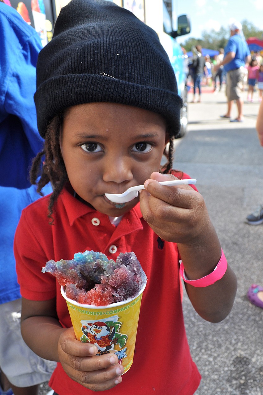 Jacoby Thomas, 3, enjoyed a rainbow sno-cone.