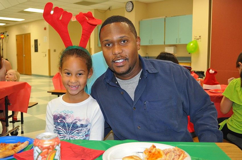Melia Haddock, first grader at Tara Elementary, with her father, Jeremy