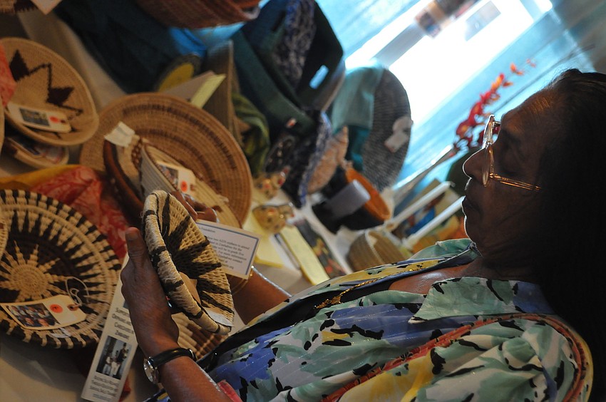 Elizabeth Antony looks at a fair trade basket.