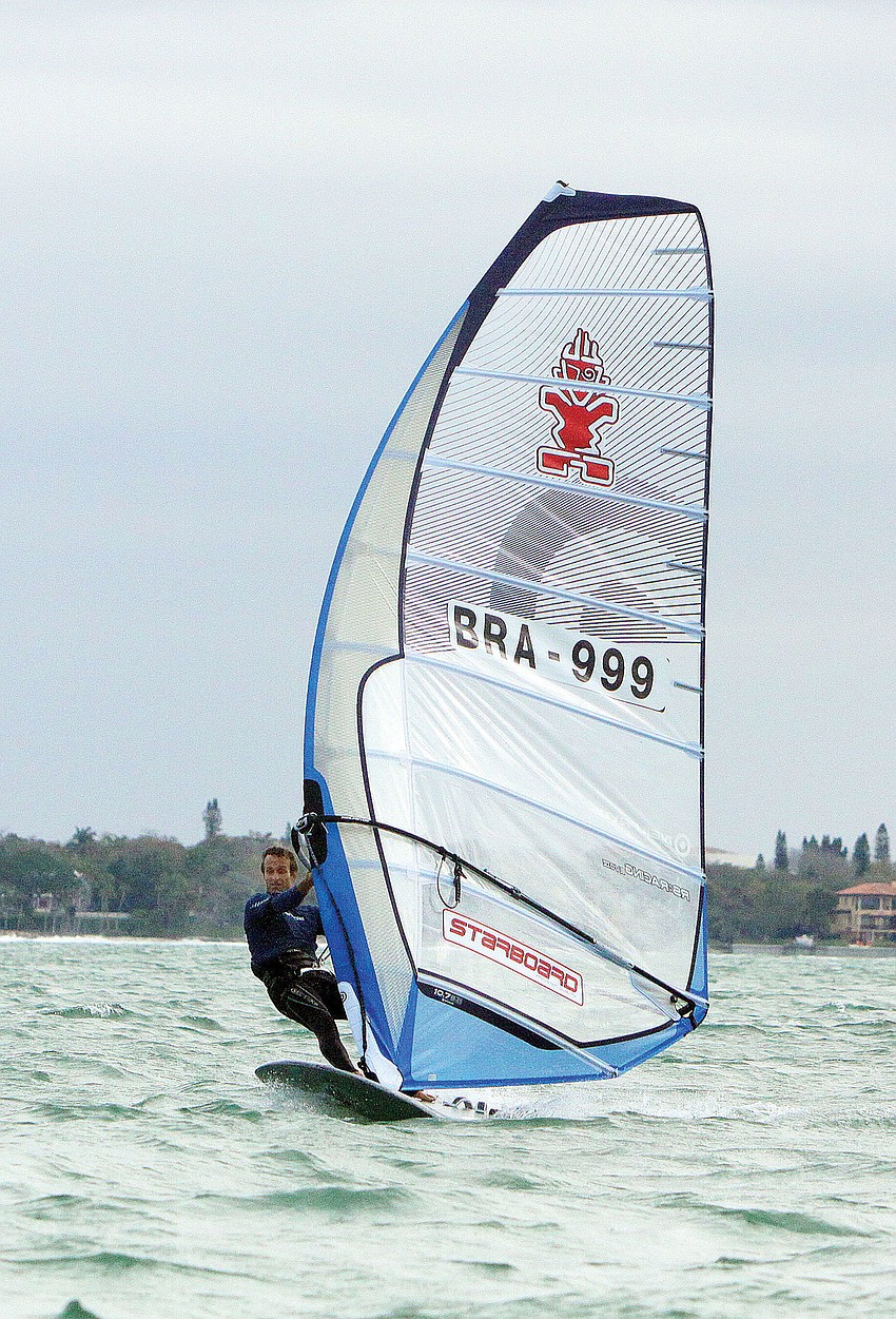 Wilhelm Schumann was a fierce competitor in the Island Style Classic wind- surfing competition at the Sarasota Sailing Squadron.