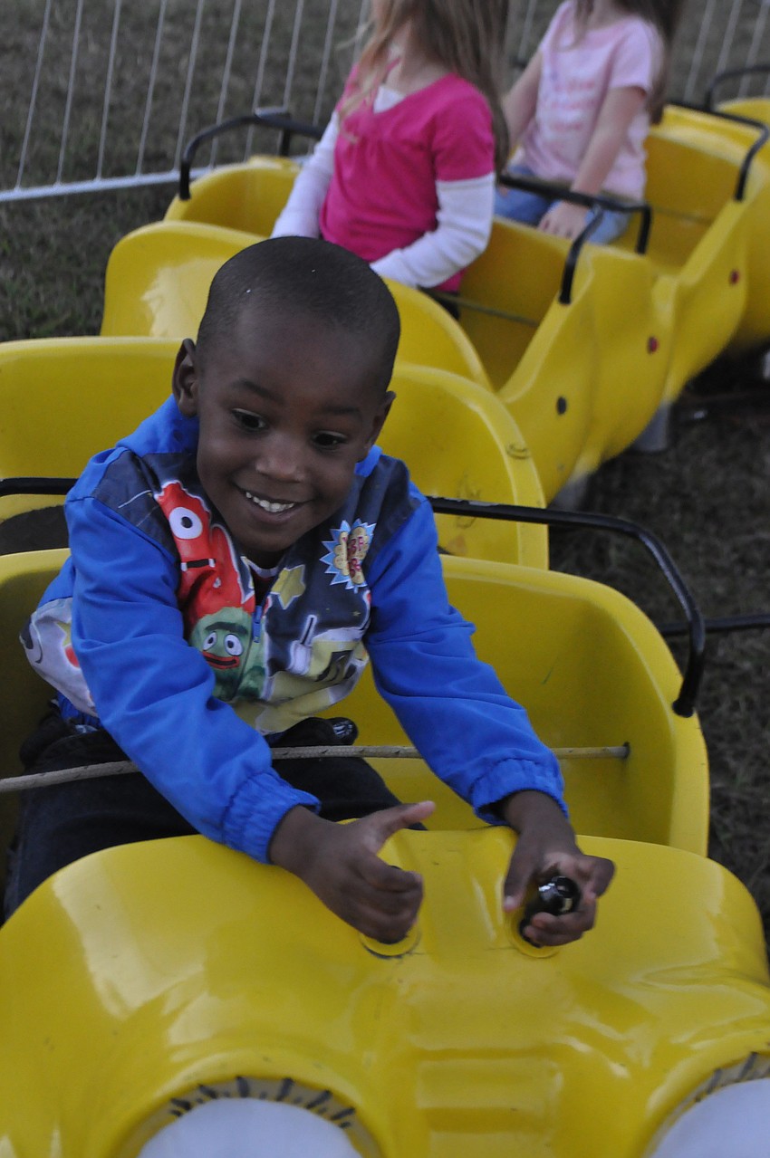 London Upshaw, 2, enjoys the ride.