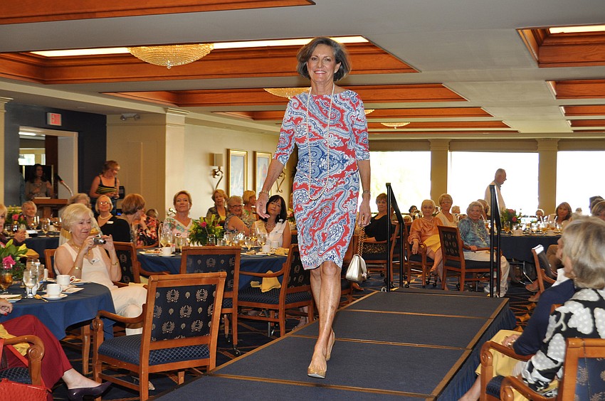Pam Rennie strutted down the catwalk during a fashion show March 29 at the Bird Key Yacht Club.