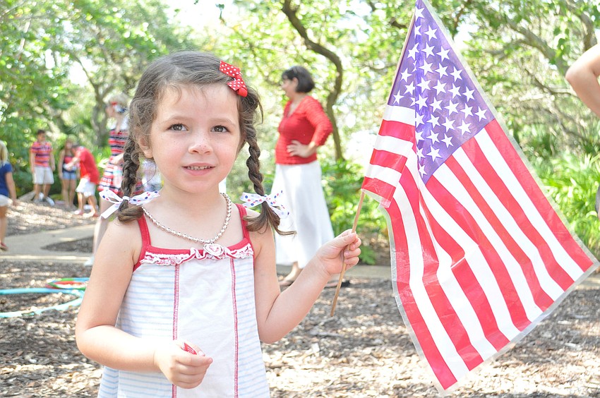 Madison Anderson showed her patriotism at the annual July 4 Longboat Key Freedom Fest parade. Mayor Jim Brown declared that the festival would be renamed â€˜The Al Hogle Freedom Festâ€™ in honor of the late police chief.