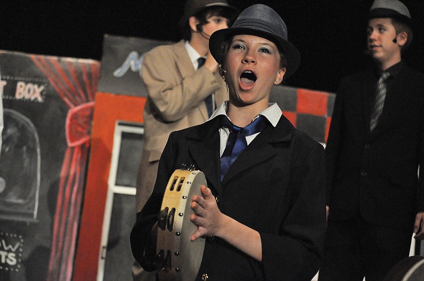 Sarah Brown, played by Taylor Hallbeck, called sinners to repentance, during Nolan Middle School's performance of 
