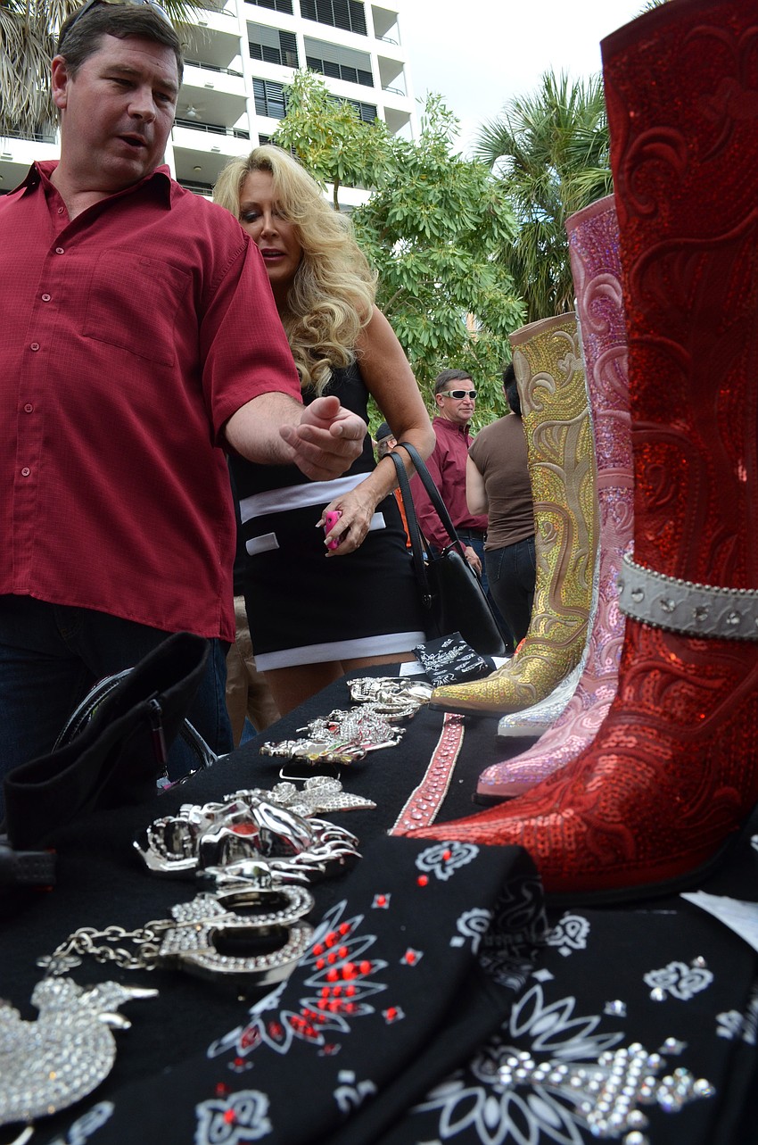 Scott Swisher checks out some sparkly boots.