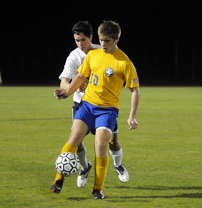 Sarasota Military Academy senior forward Logan Moriarty looks to control the ball in the first half. Moriarty scored the lone goal for the Eagles.