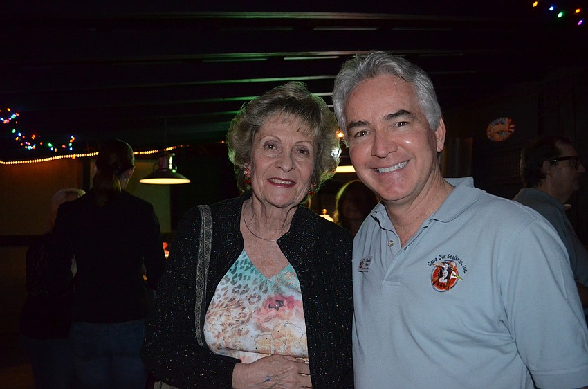 Volunteer Beverly Meadows and Chief Executive Officer David Pilston
