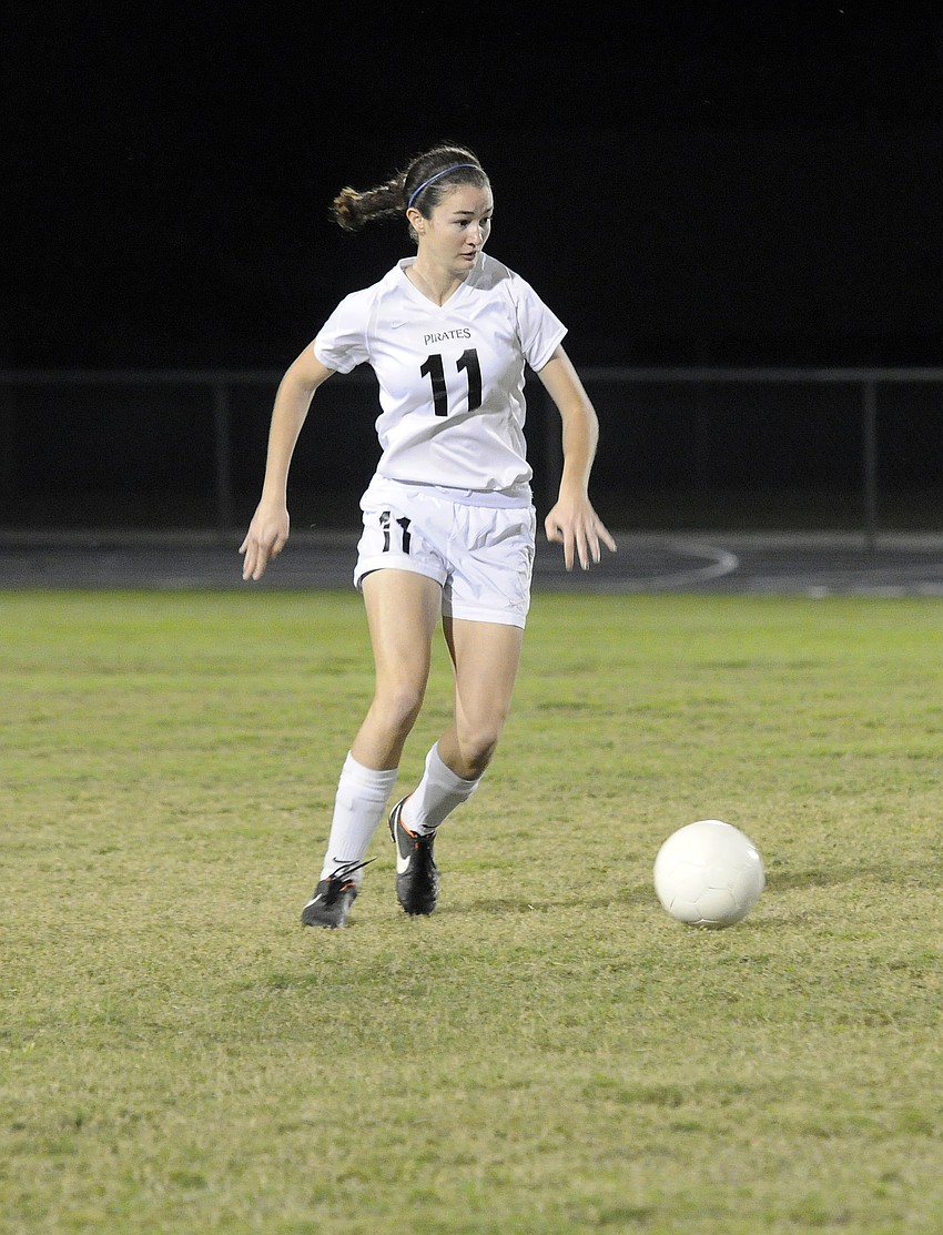 Braden River co-captain Bridget Lanier charges toward the ball in the first half.