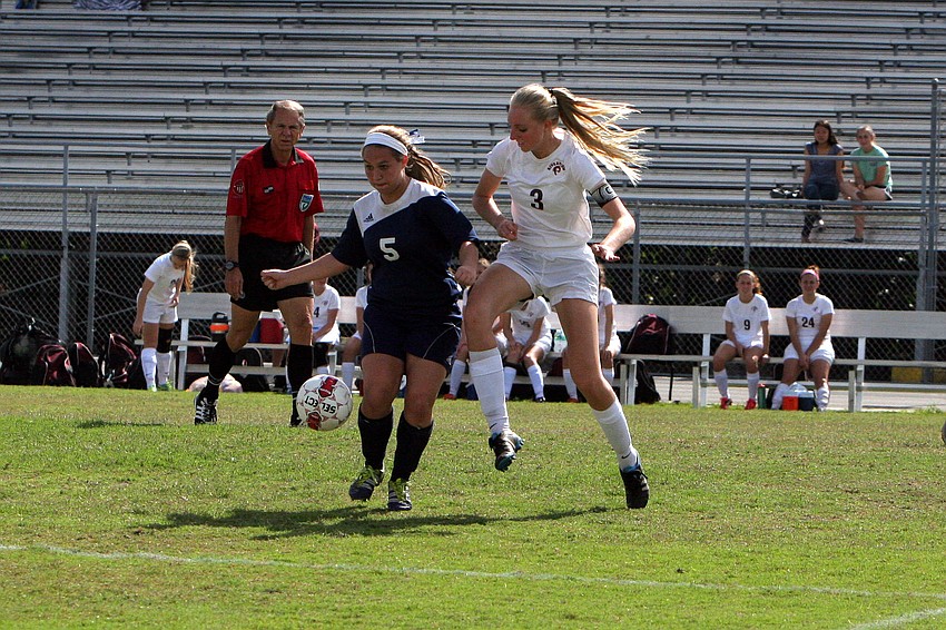 North Portâ€™s Jenna Staub, No. 5, and Riverviewâ€™s Gabrielle Falco, No. 3, both go for the ball.