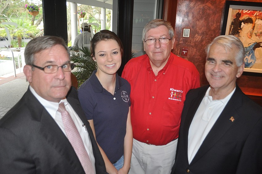 Richard Crawford, Abigail Oakes, president of Circle Key International Club of New College, John Wild, Jim Burmeister