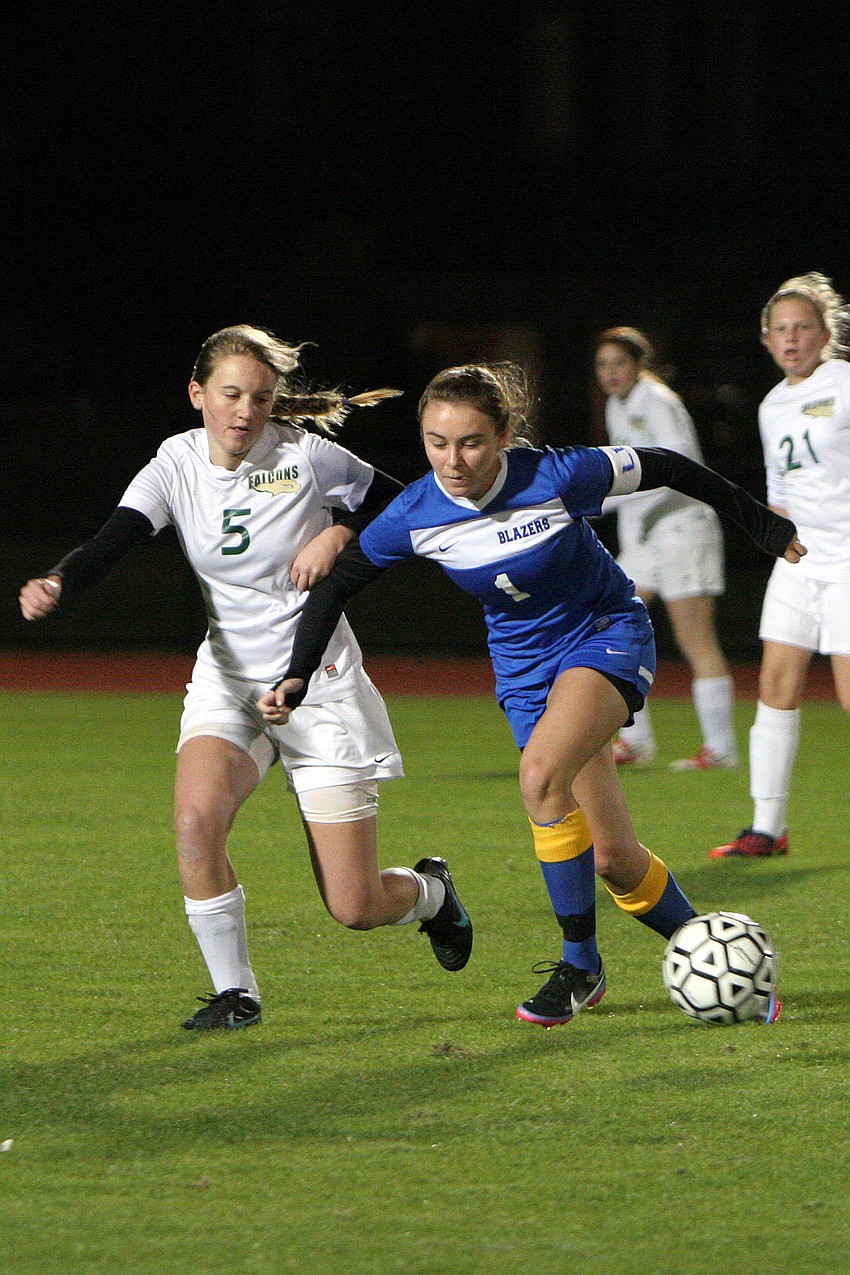 St. Stephenâ€™s Kayla Hayes, No. 5, tries to get the ball away from Sarasota Christianâ€™s Cece Genson, No. 1.