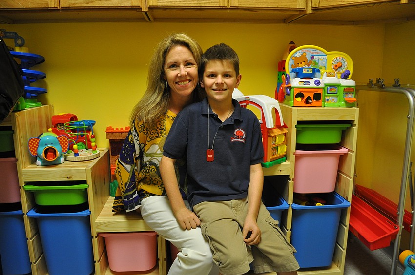 Sandy and Jason Albano inside Paytonâ€™s Playroom, named for Payton Wright, who died of pediatric brain cancer