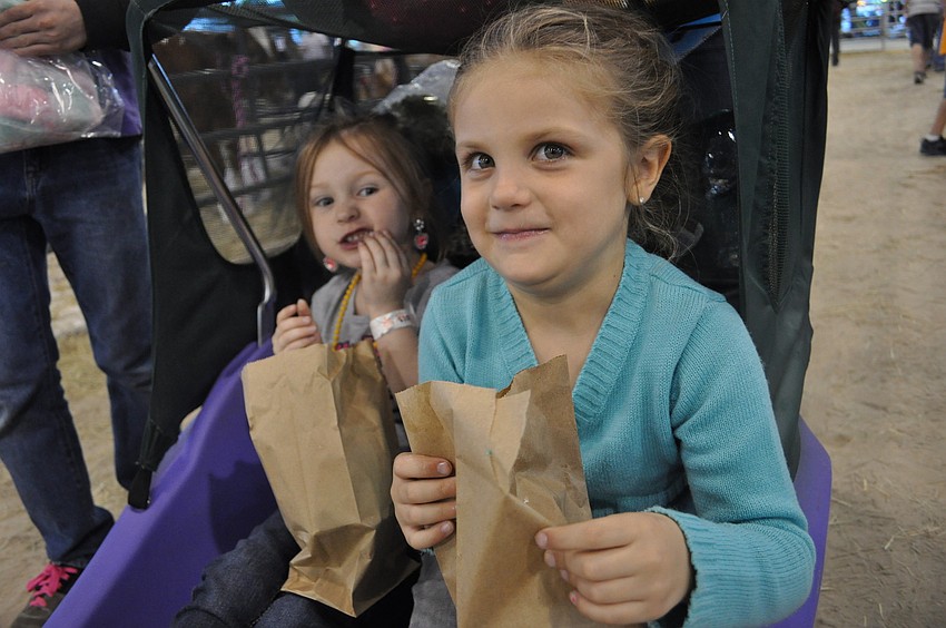 Cousins Veda Lococo and Audrey Robuck eagerly looked at the livestock.