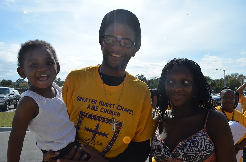 Demetrius Rock with his second cousin Jaâ€™Laziah Hill and her mother Jerrica Hill.